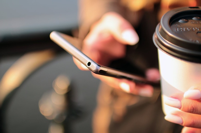 hands free mobile phone and a coffee